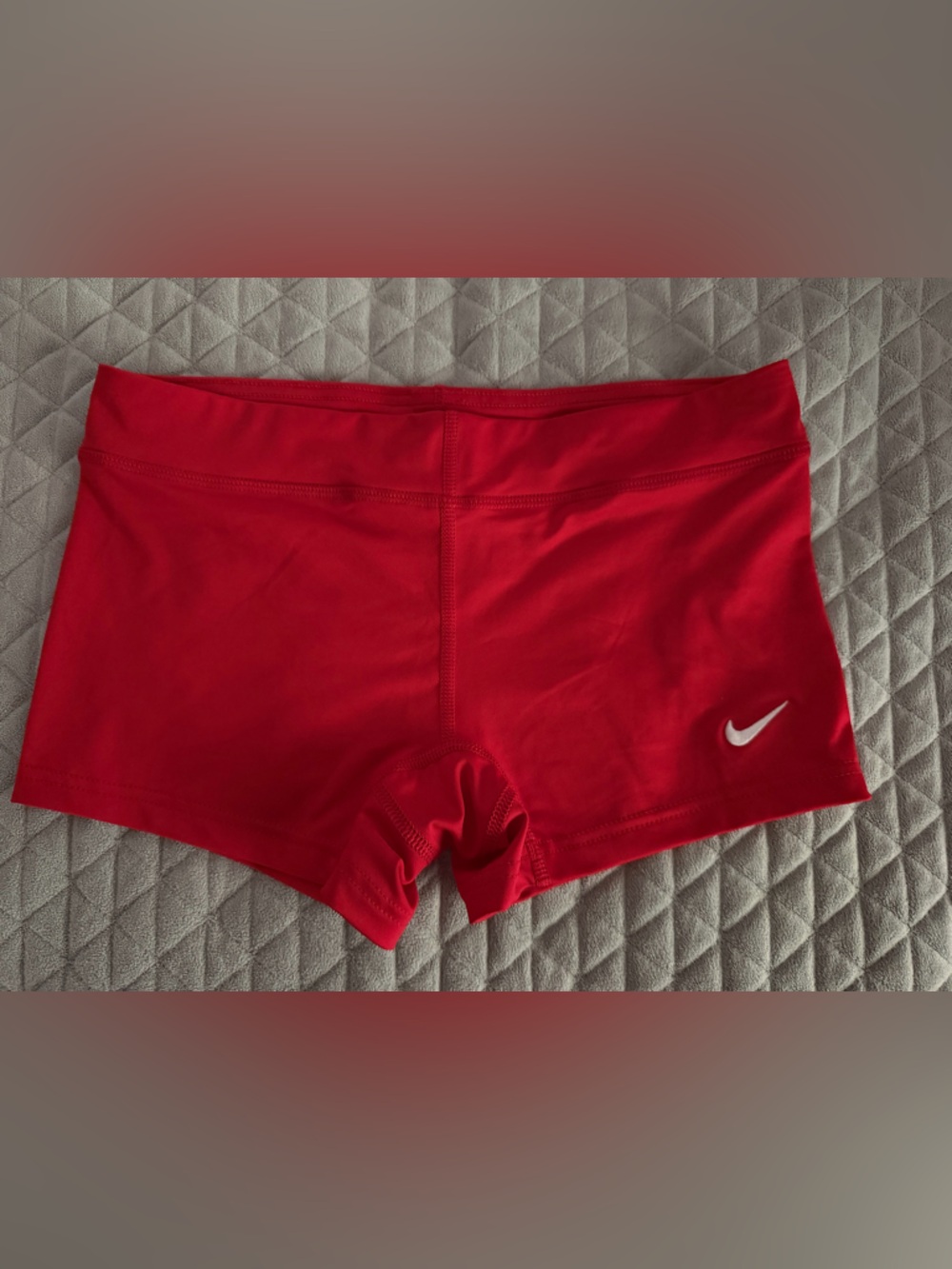 Nike Women’s Red Shorts with White Swoosh